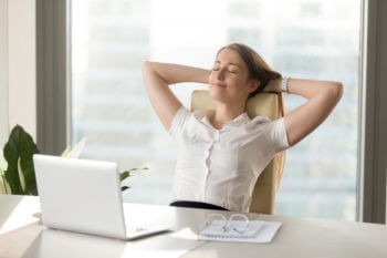 woman relaxing at desk