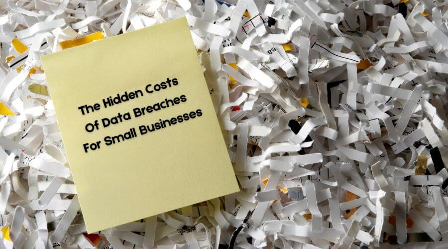 Image of a note on top of a pile of paper that says "The Hidden Costs of Data Breaches for Small Businesses" 